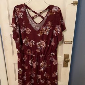 Knee length maroon flowery dress.